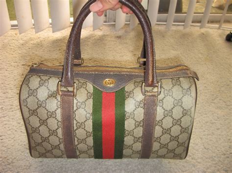 how to tell if a vintage gucci purse is real|authentic vintage gucci.